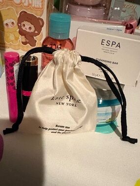 kate spade cream satin drawstring pouch with earrings bundle